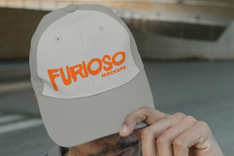 White baseball cap with bold orange Furioso Mockups lettering