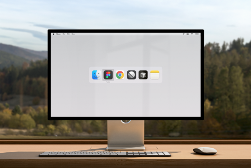 Computer screen mockup displaying app icons for design software with scenic nature view in background suitable for designers' digital assets marketplace