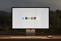 Computer screen mockup displaying desktop app icons in a modern workspace. Perfect for showcasing design projects. Keywords: mockup, desktop, workspace.
