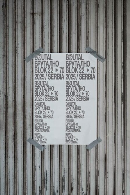 White poster taped to corrugated metal showing repeated Brutal Brutalno text layout