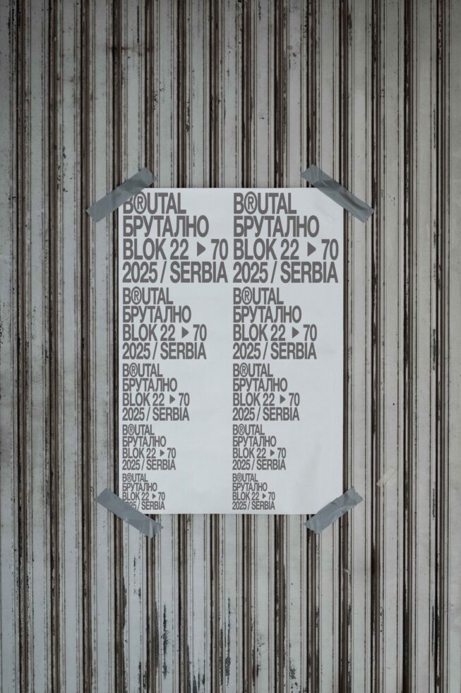 White poster taped to corrugated metal showing repeated Brutal Brutalno text layout