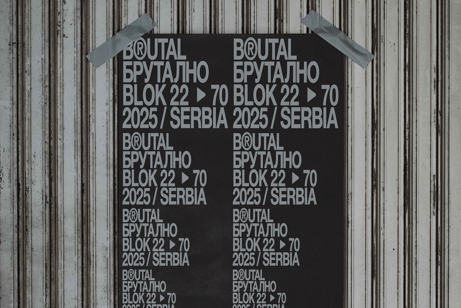 Black poster with white Brutal Brutalno typography grid pattern on metal wall