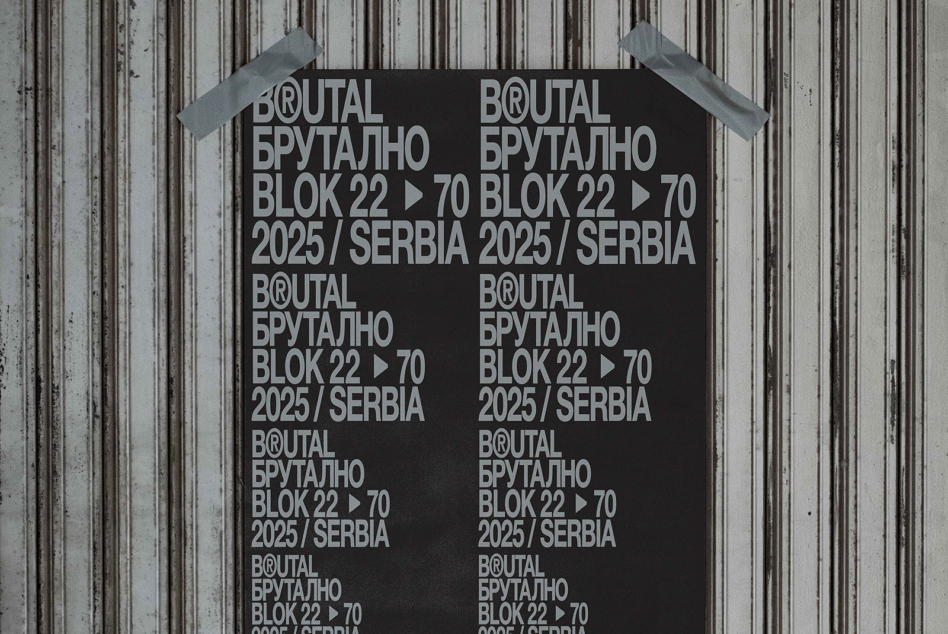 Black poster with white Brutal Brutalno typography grid pattern on metal wall