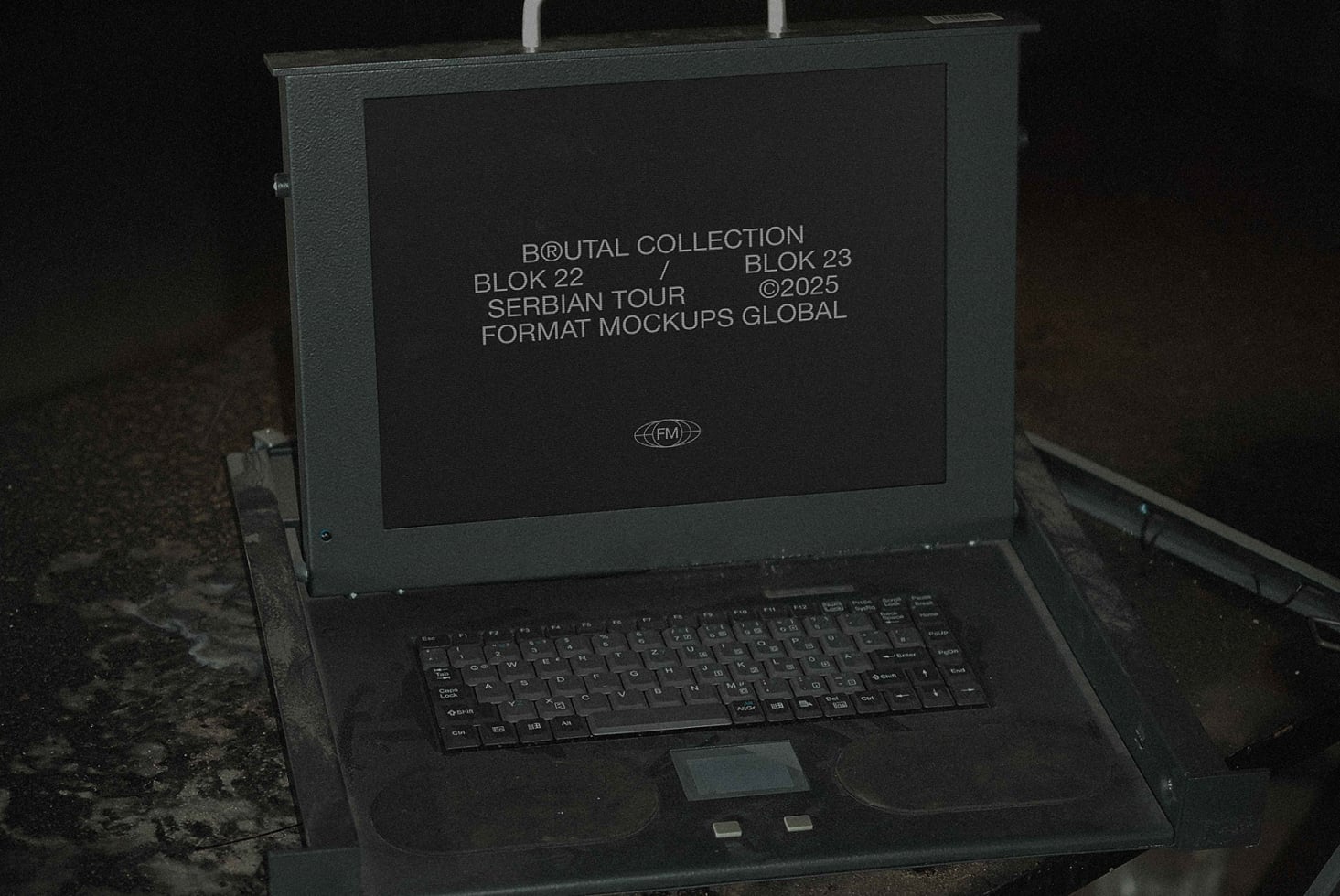 Laptop screen displaying Brutal Collection Block 22 info text