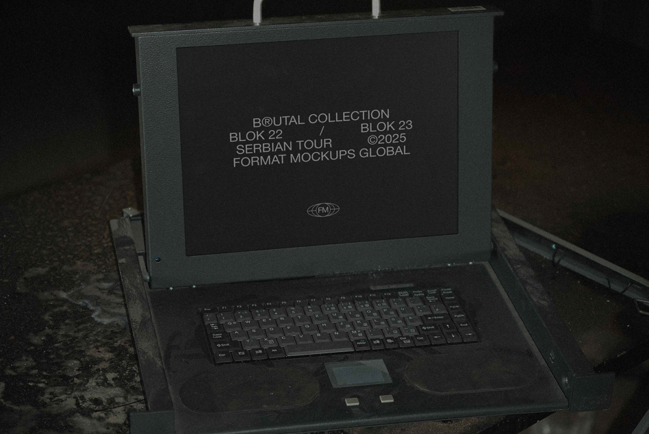 Laptop screen displaying Brutal Collection Block 22 info text