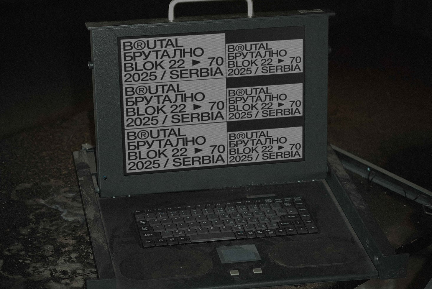 Laptop showing six repeated Brutal Block 22 label mockups
