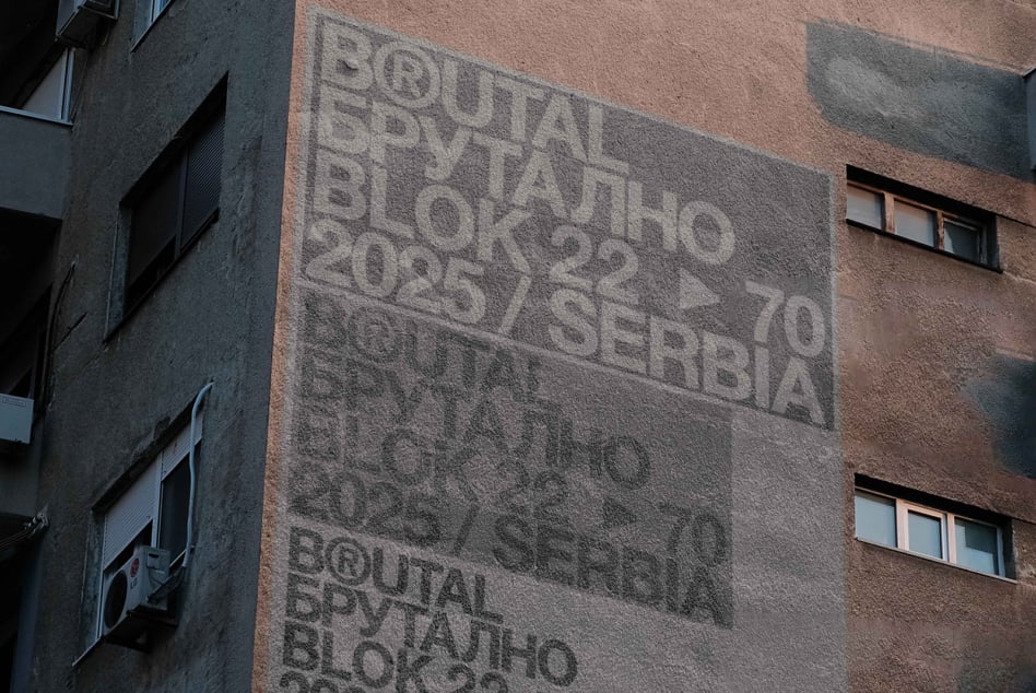 Weathered brick wall showing Brutal Brutalno typography in soft shadow effect
