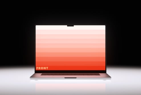 Laptop screen displaying peachy gradient color palette from light to vibrant red