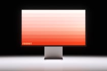 Monitor on stand displaying horizontal stripe gradient white to coral
