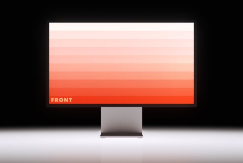 Monitor on stand displaying horizontal stripe gradient white to coral
