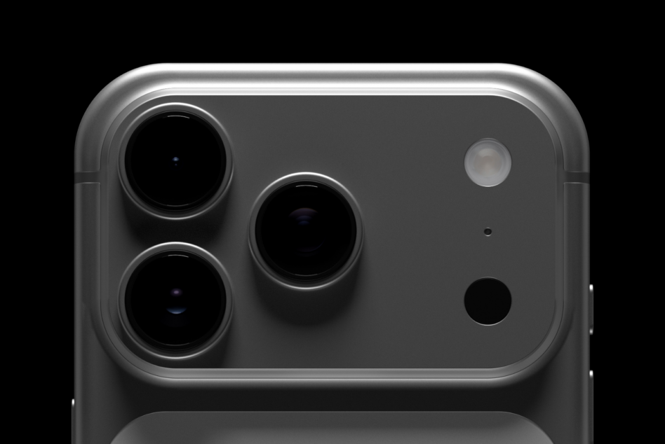 Triple camera setup on dark phone back with sensor details visible