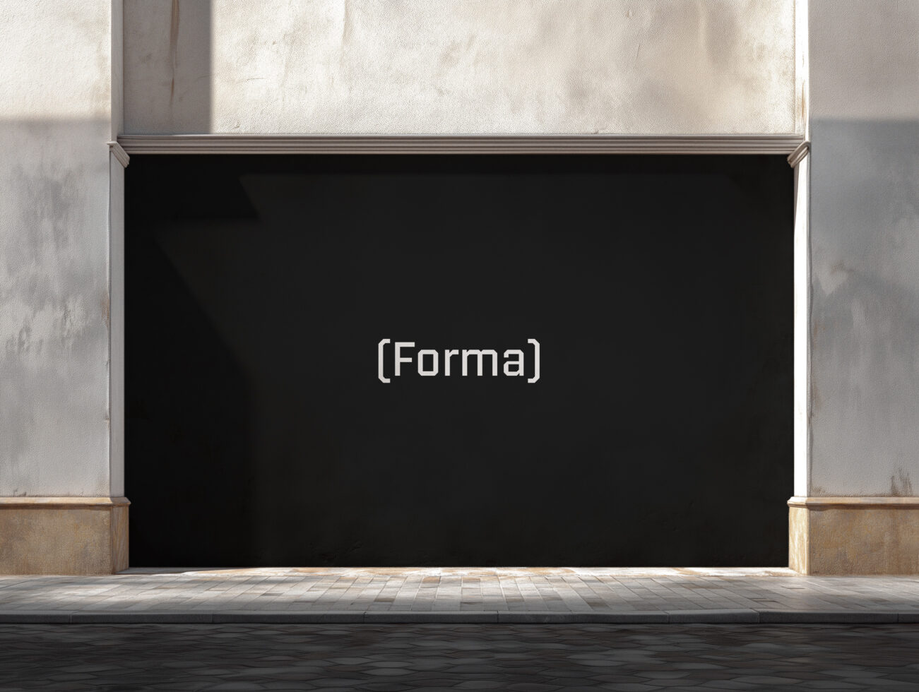Black storefront window with metal frame on textured concrete wall