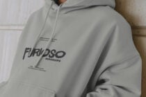 Light gray hoodie displaying Furioso Mockups branding on front