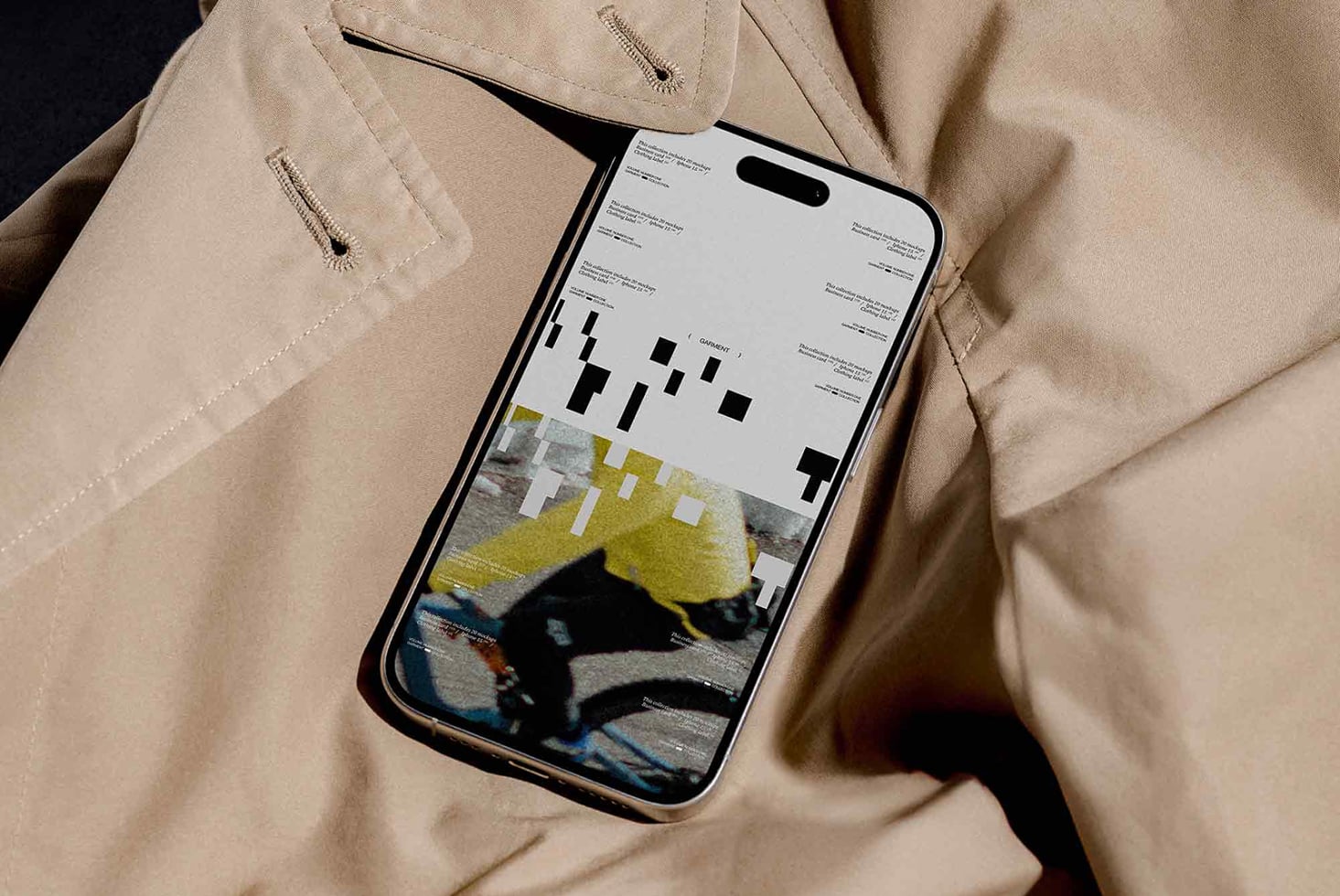 iPhone showing layout with yellow accents held in hand against dark background