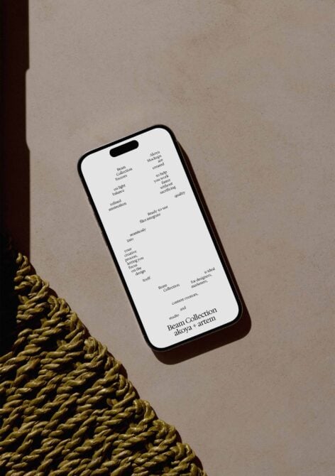 iPhone mockup displaying Beam Collection type layout on beige background with gold rope