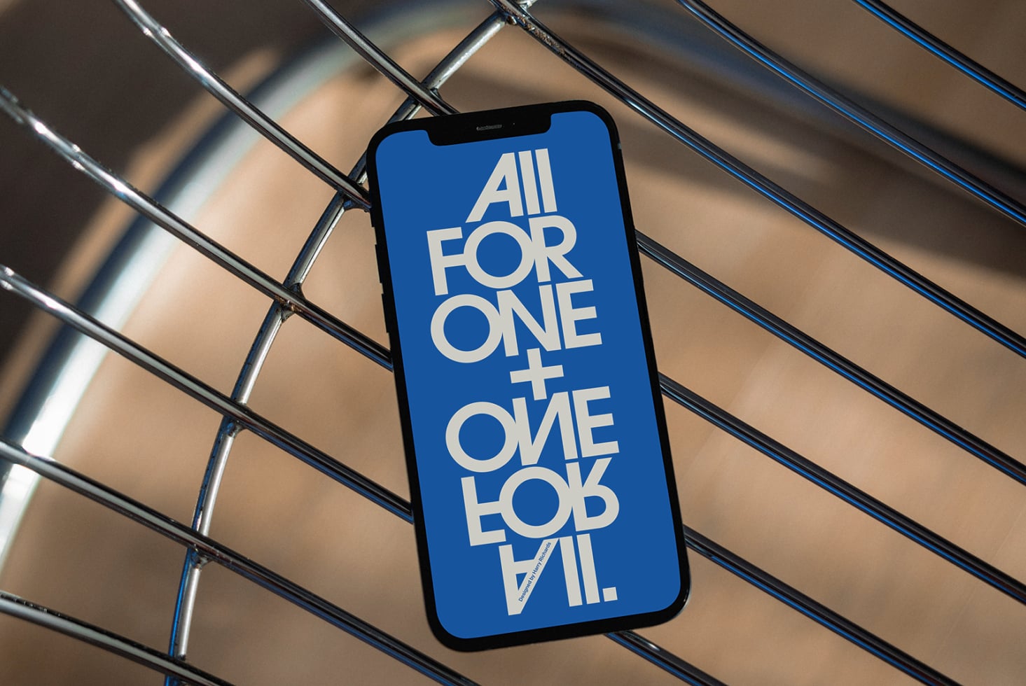iPhone mockup with bold white typography on bright blue screen against metallic ribbed background