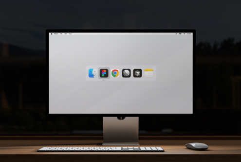 Modern workspace setup showcasing a high-resolution monitor displaying design apps icons, ideal for digital assets mockup and designers desktop template.