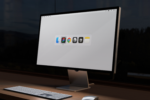 Desktop computer mockup featuring a sleek monitor displaying app dock icons. Ideal for showcasing digital designs software interfaces templates graphics.