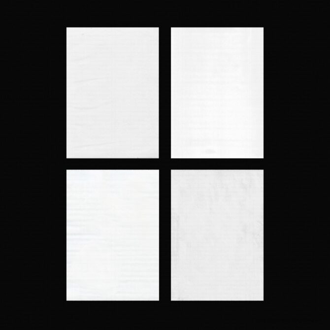 Four blank white poster frames arranged in 2x2 grid on black background