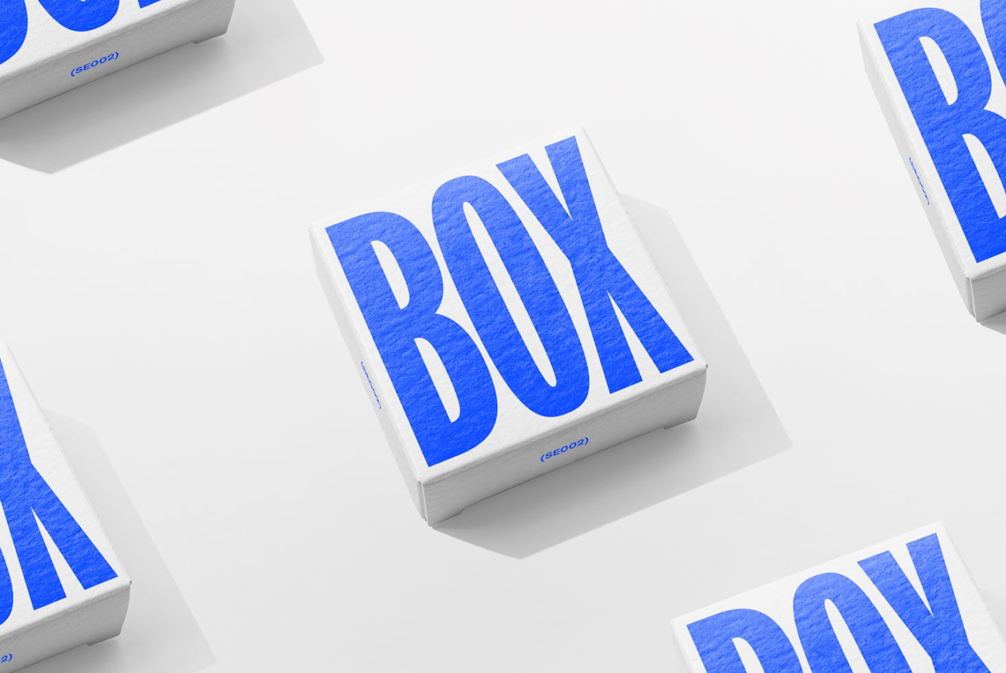 White boxes with textured blue BOX lettering on light gray background