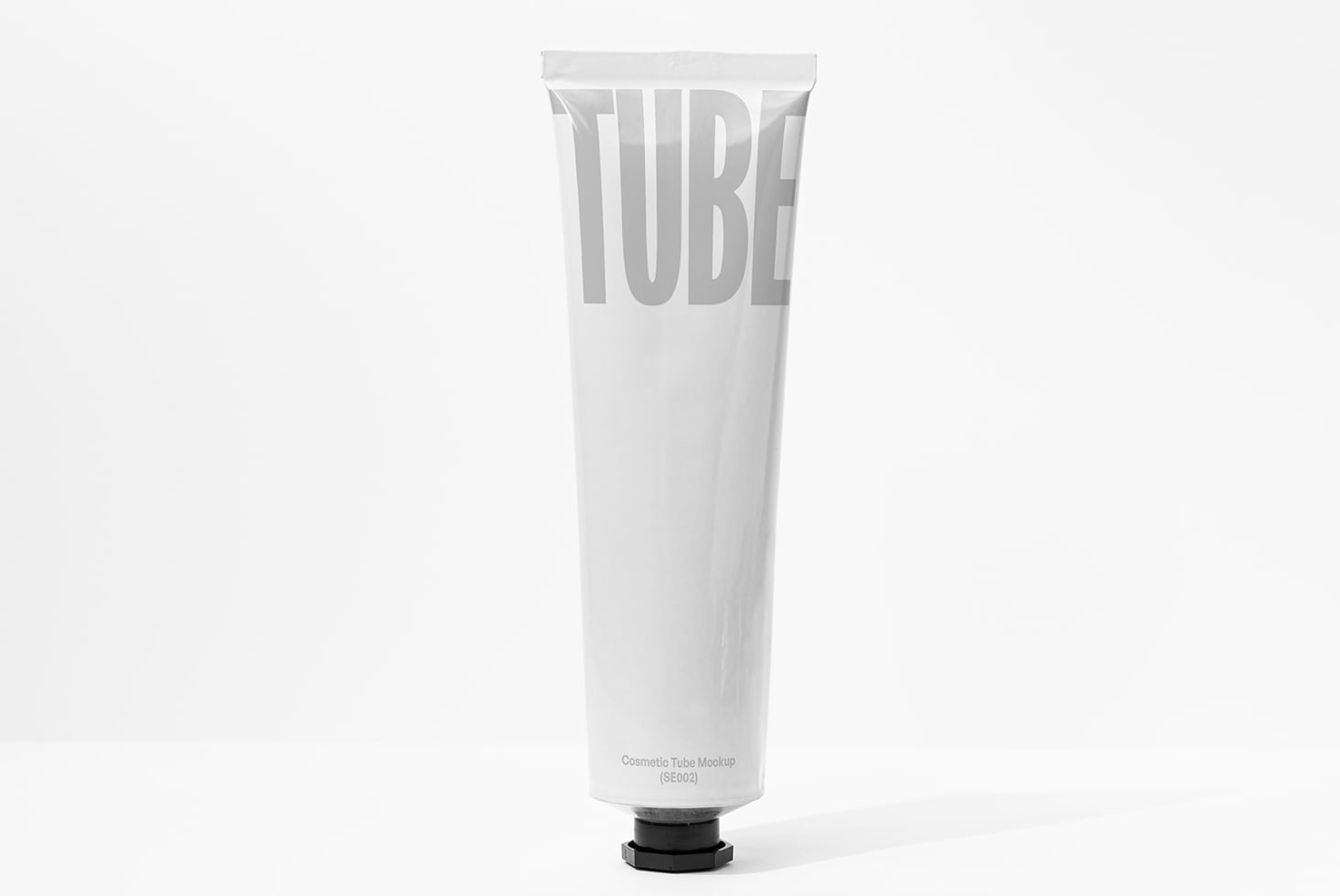White cosmetic tube mockup with gray TUBE text on cap