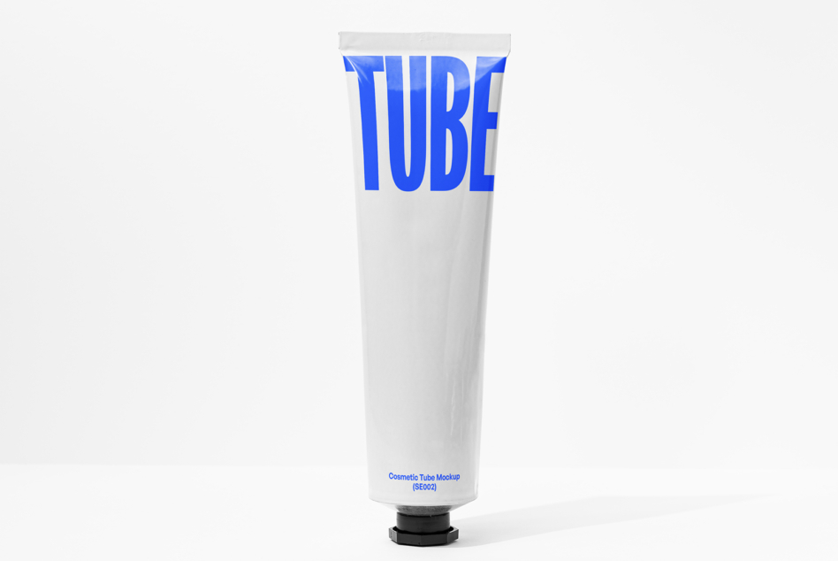 White cosmetic tube mockup with bright blue TUBE text label on front