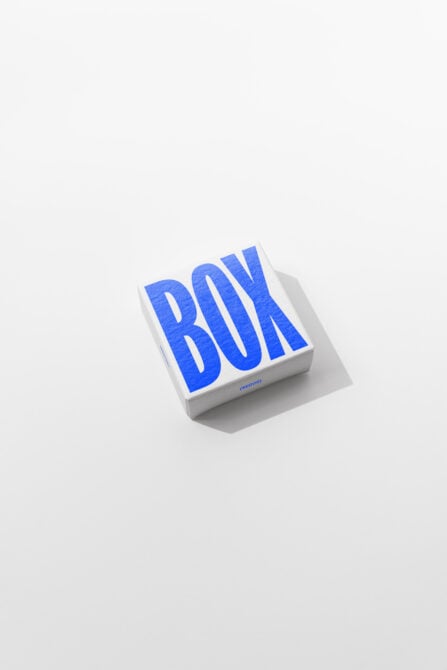 White square box mockup with bright blue BOX text on top