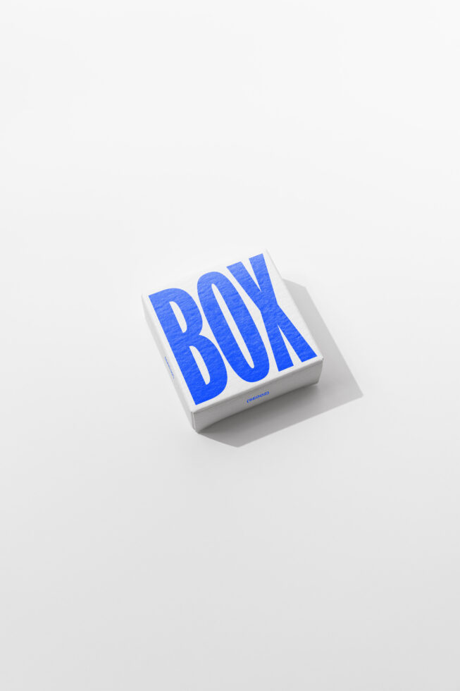 White square box mockup with bright blue BOX text on top