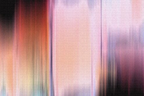 Soft blurred gradient flowing from deep red through pink to pale lavender