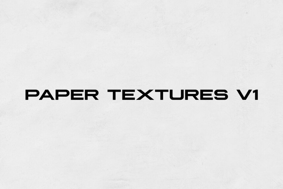 Light beige paper texture with fine grain detail, subtle speckles scattered throughout