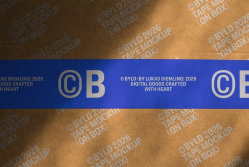 Kraft tape on brown box with blue label showing CB initials