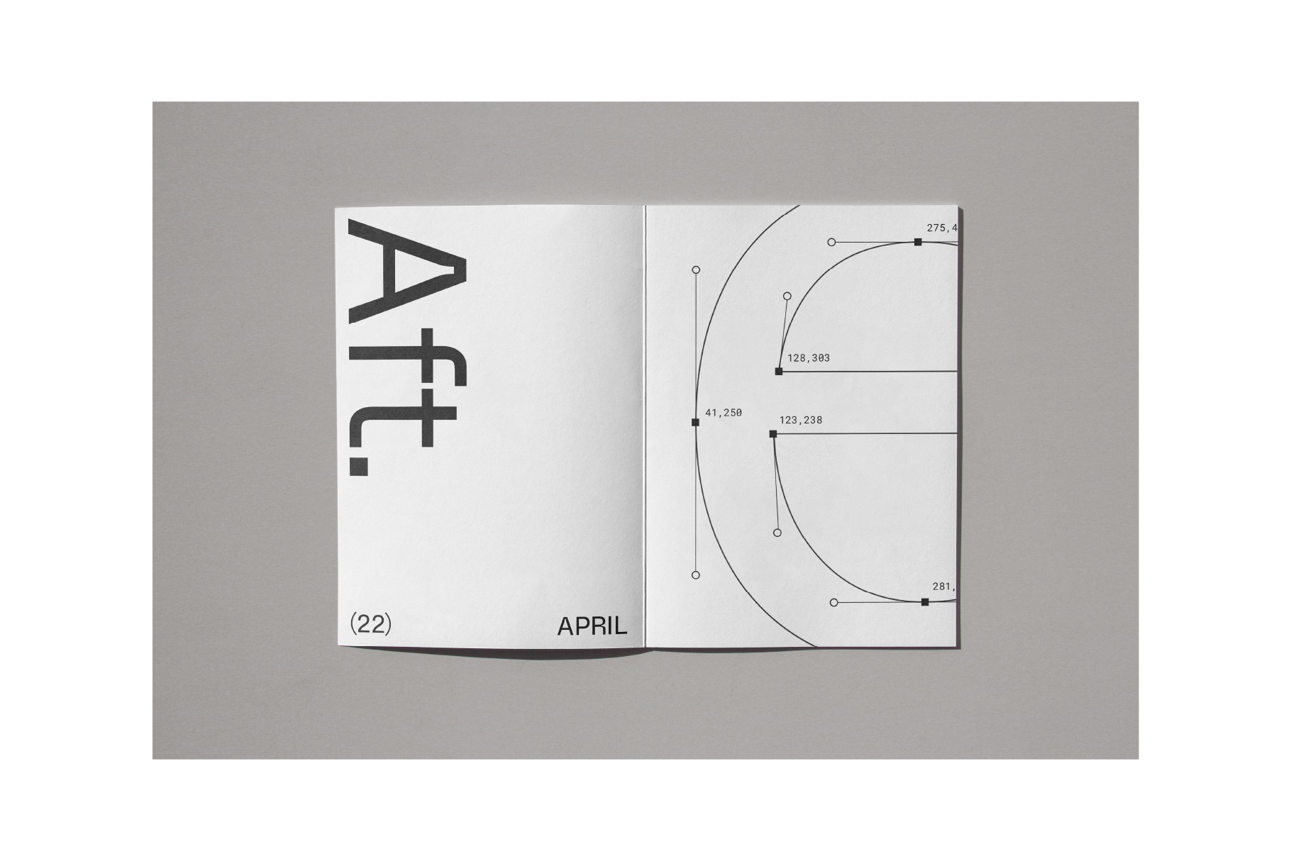Open magazine spread showing April issue with technical drawings