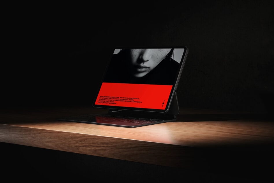 Tablet mockup displaying split layout with portrait photo above red design section