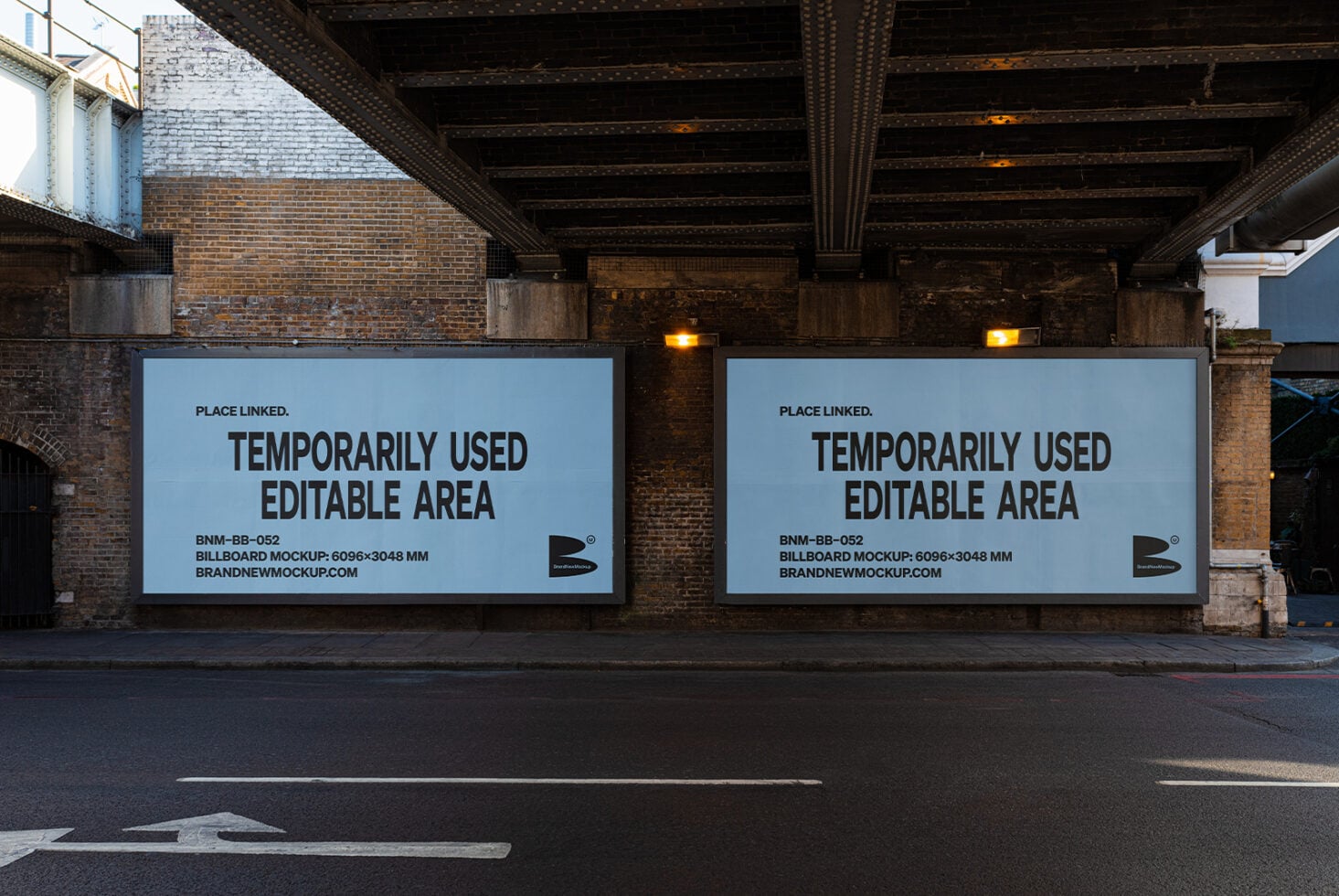 Two large rectangular billboards under bridge, light blue background with dark text