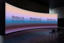 Large curved LED display mockup with soft gradient colors in modern interior
