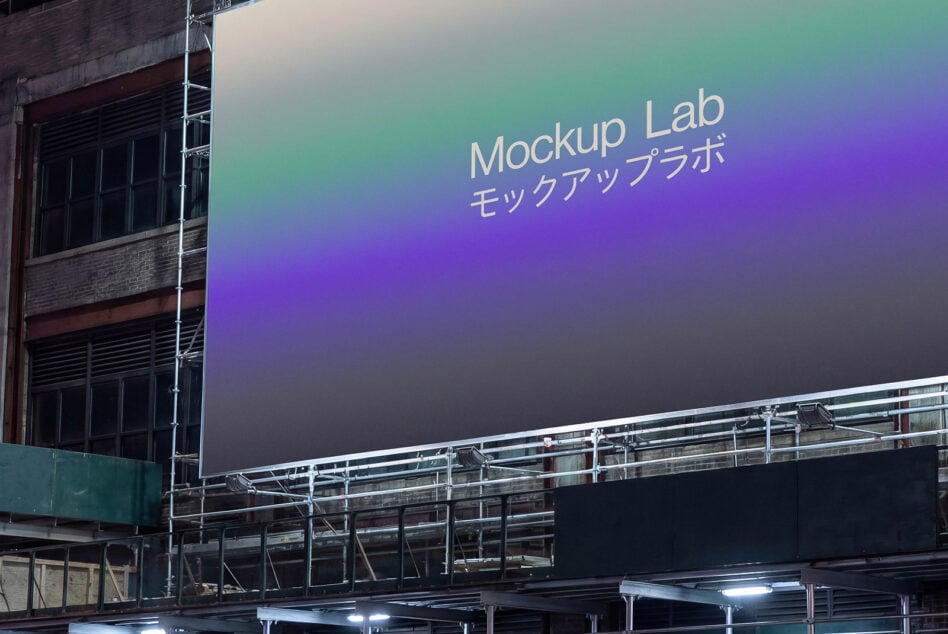 Outdoor billboard with gradient design against urban construction site