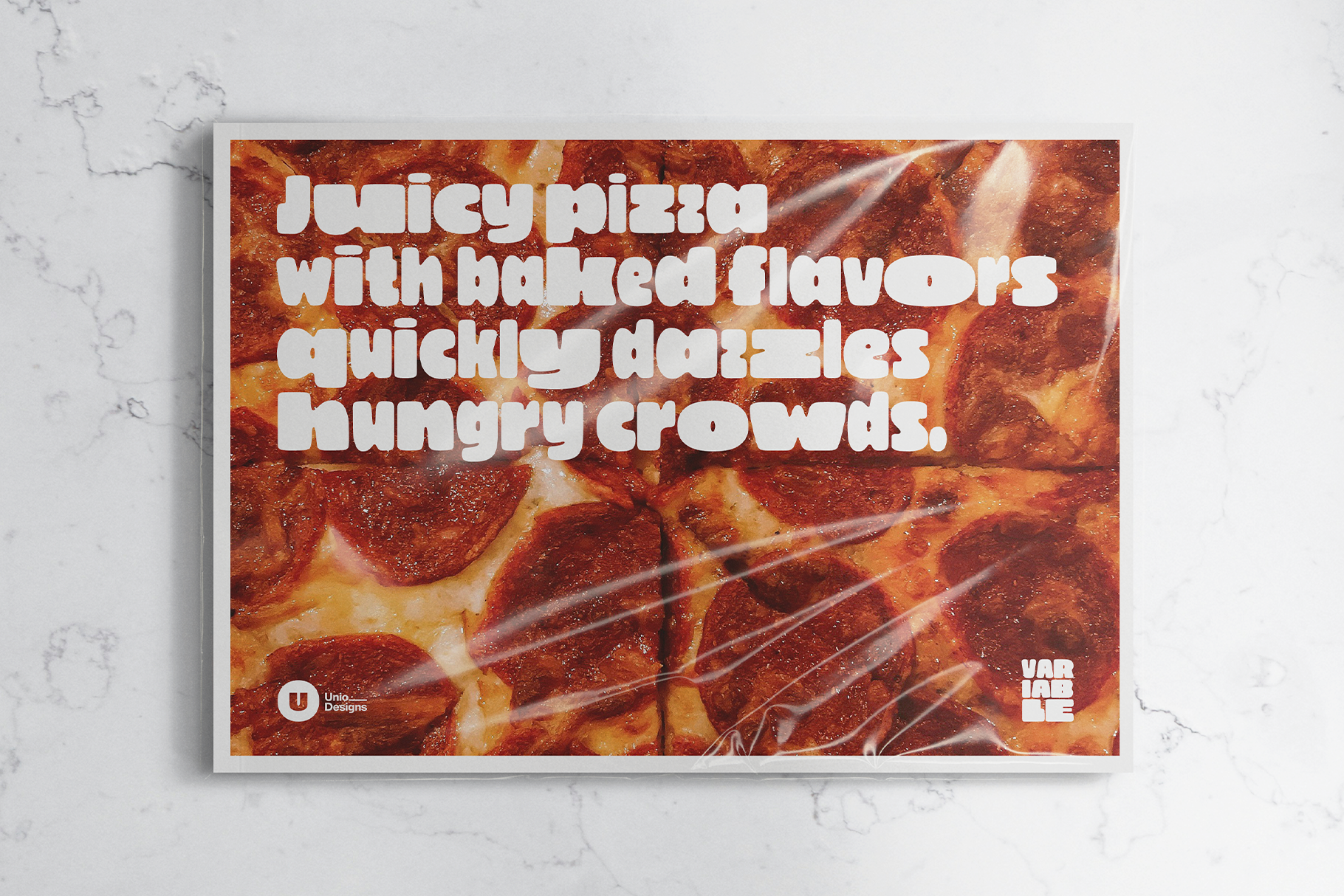 Pizza close-up with white text overlay on greasy pepperoni surface