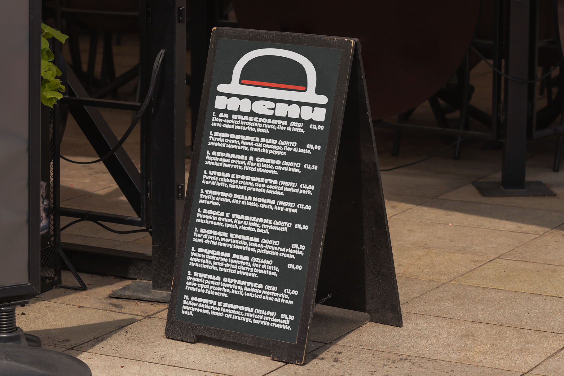 Restaurant menu board A-frame sandwich sign on sidewalk featuring rounded cap logo