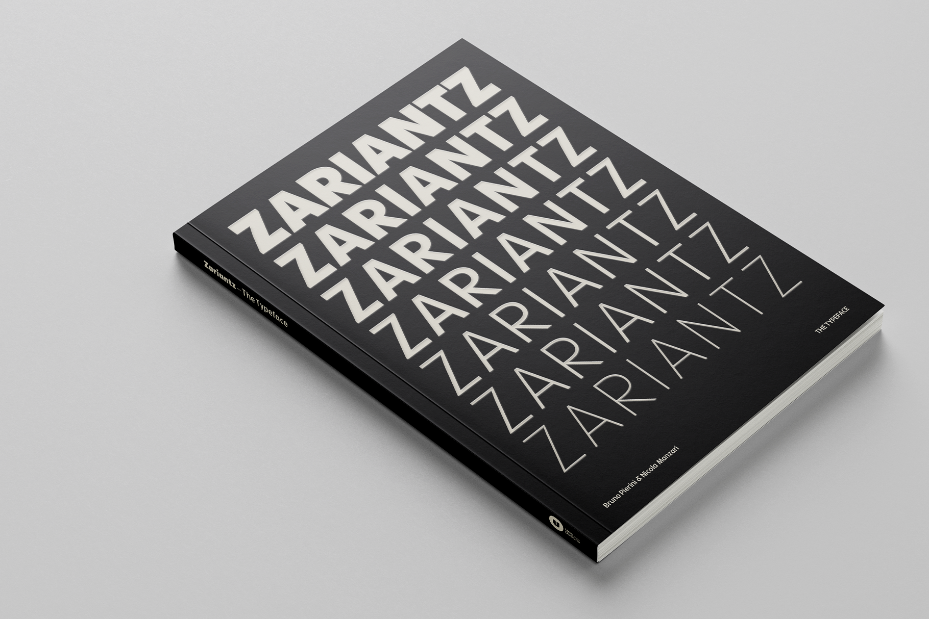 Black hardcover book with repeating Zariantz text in white, angled perspective view