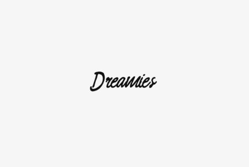 Dreamies script typeface in flowing italic handwriting style