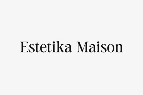 Estetika Maison serif font name in elegant black letters on light background