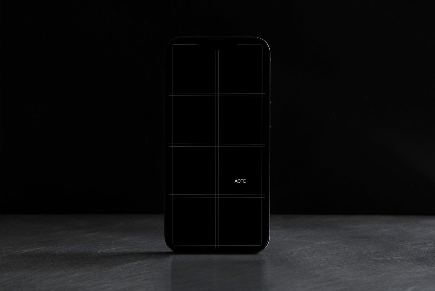 Black smartphone with 6-cell grid layout on dark background