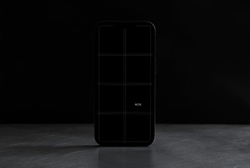 Black smartphone with 6-cell grid layout on dark background