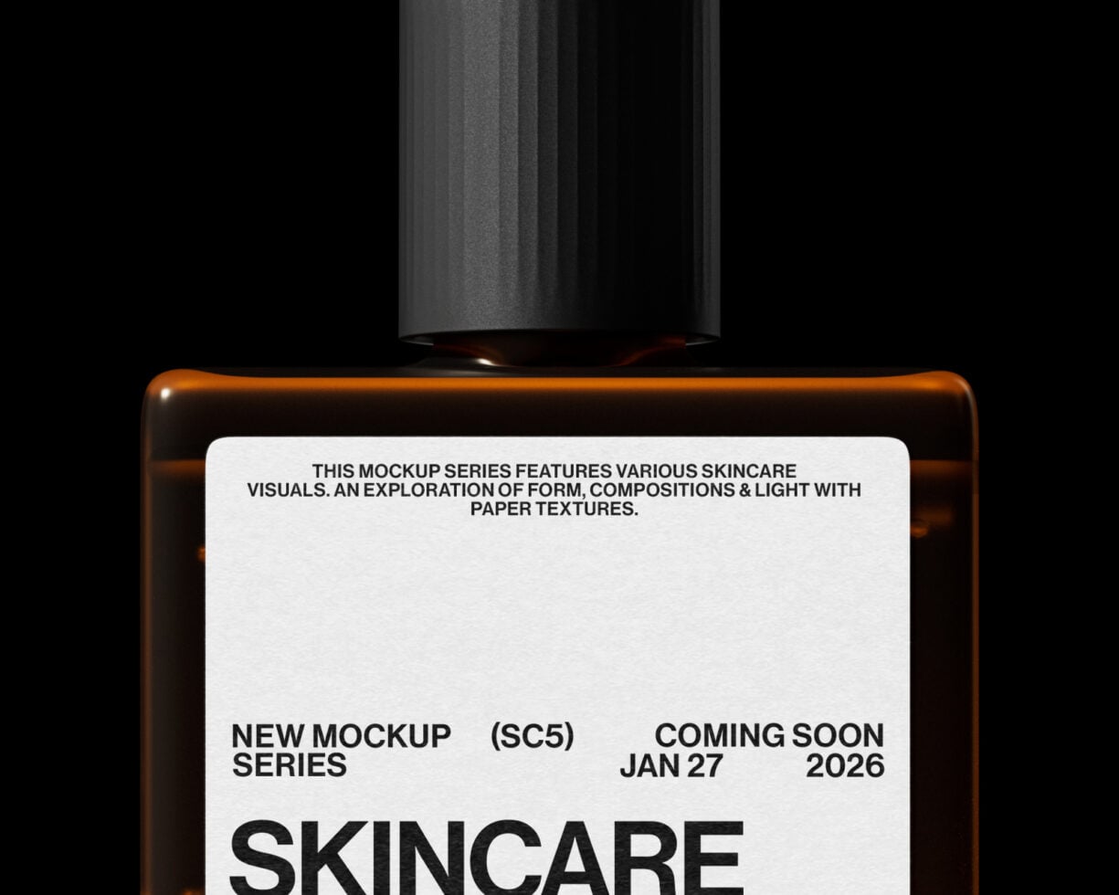 Top view of amber dropper bottle with black cap over white label mockup