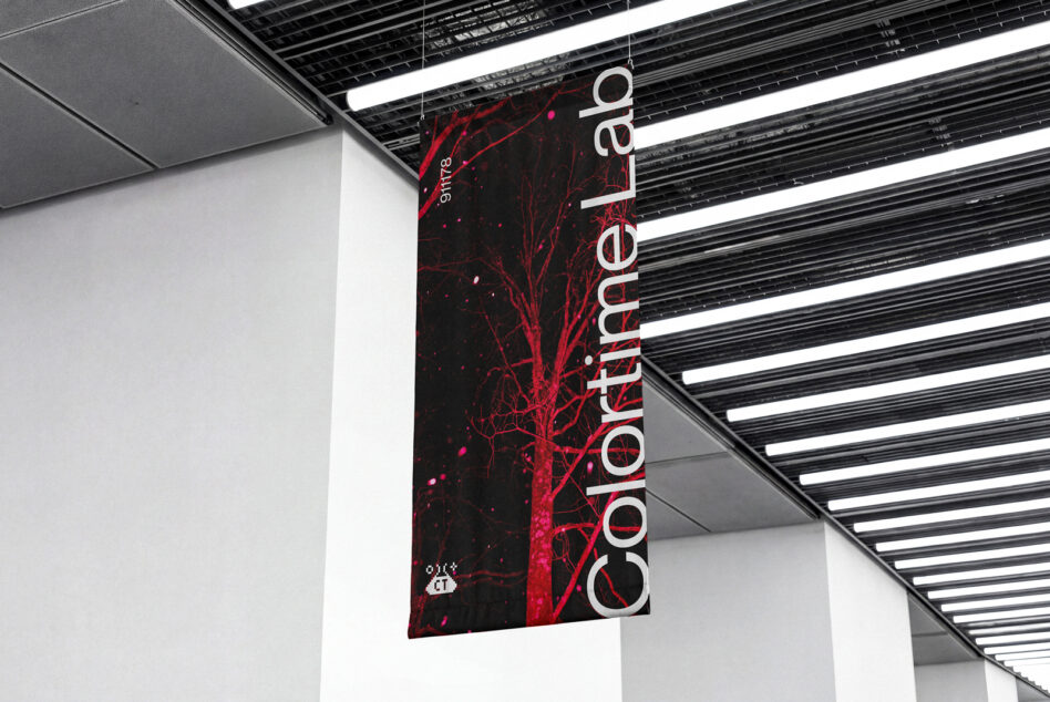 Vertical banner with red tree branch graphic on dark background hanging indoors