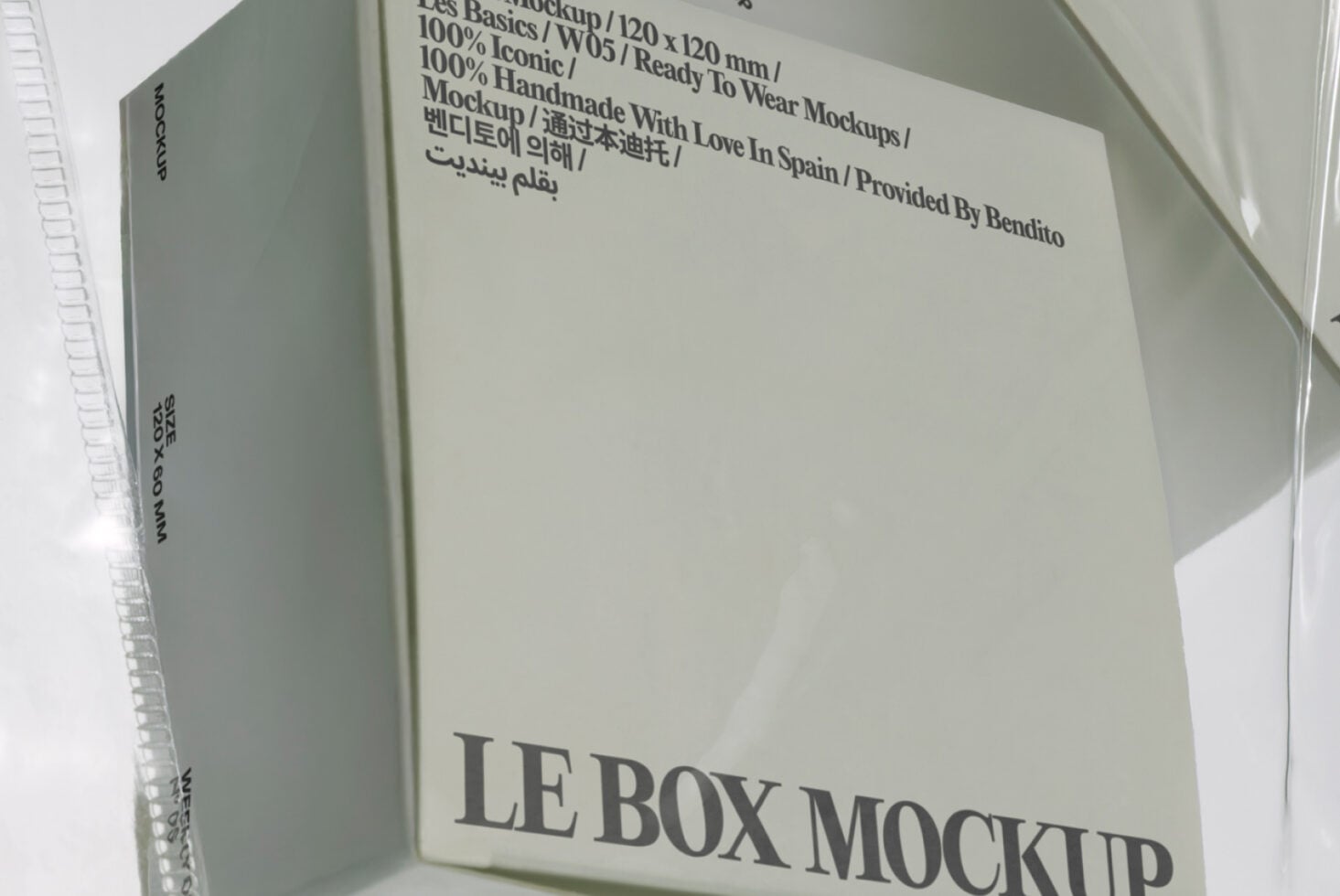 Cream colored box mockup with dark text on angled surface, minimalist setup