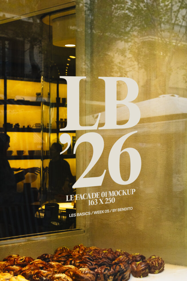 Light storefront window with large typography mockup over textured wall