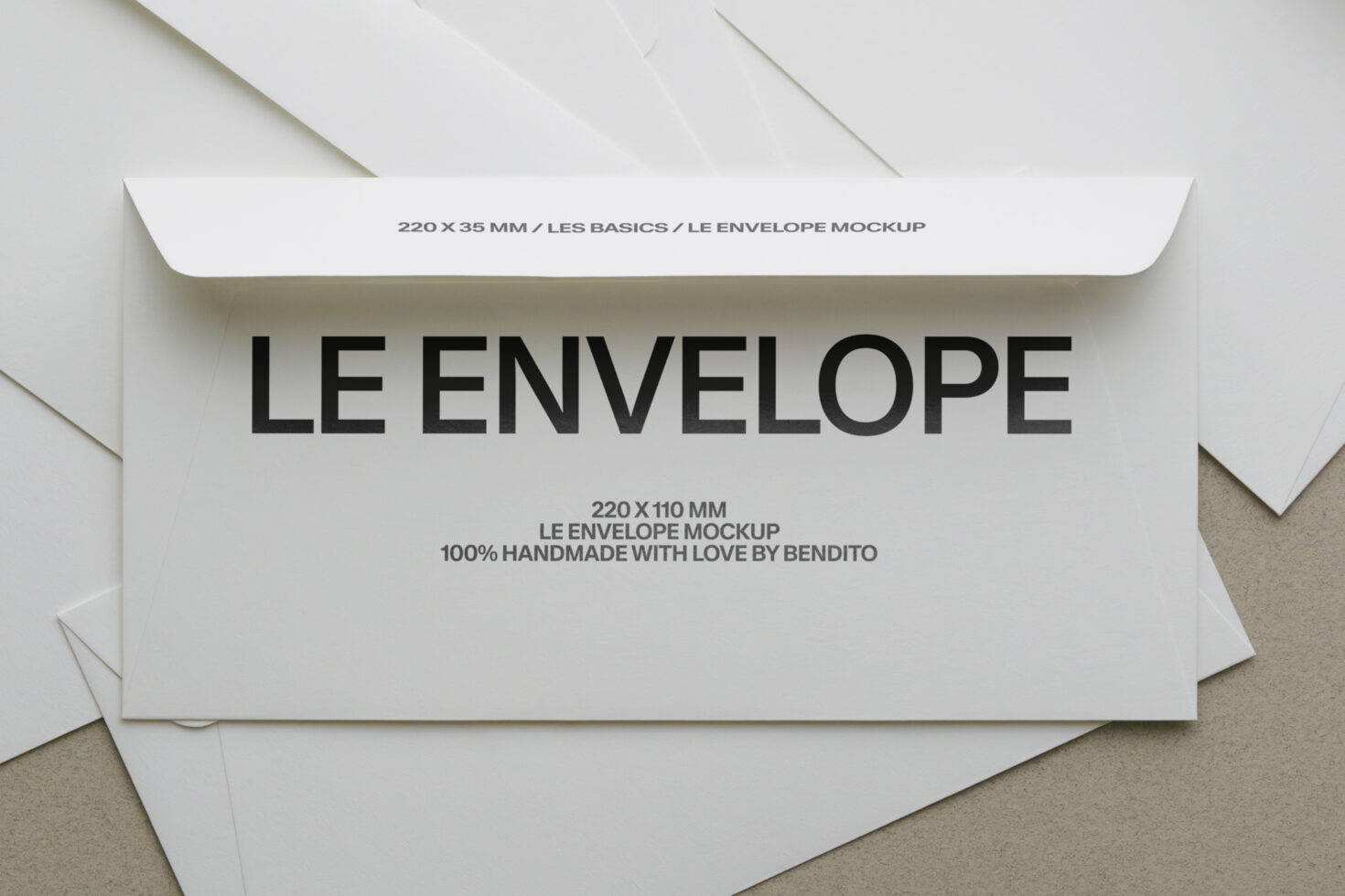 White envelope mockup with Le Envelope text, handmade branding by Bendito on beige background