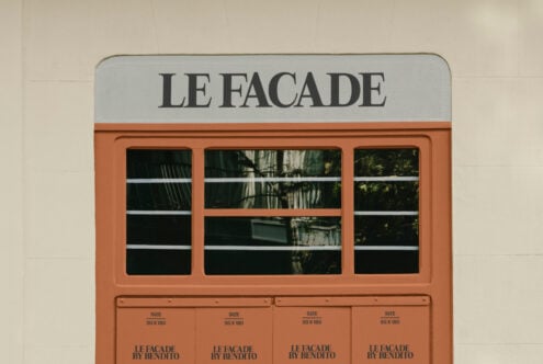 Terracotta storefront mockup with Le Facade branding, three display windows with product sizing