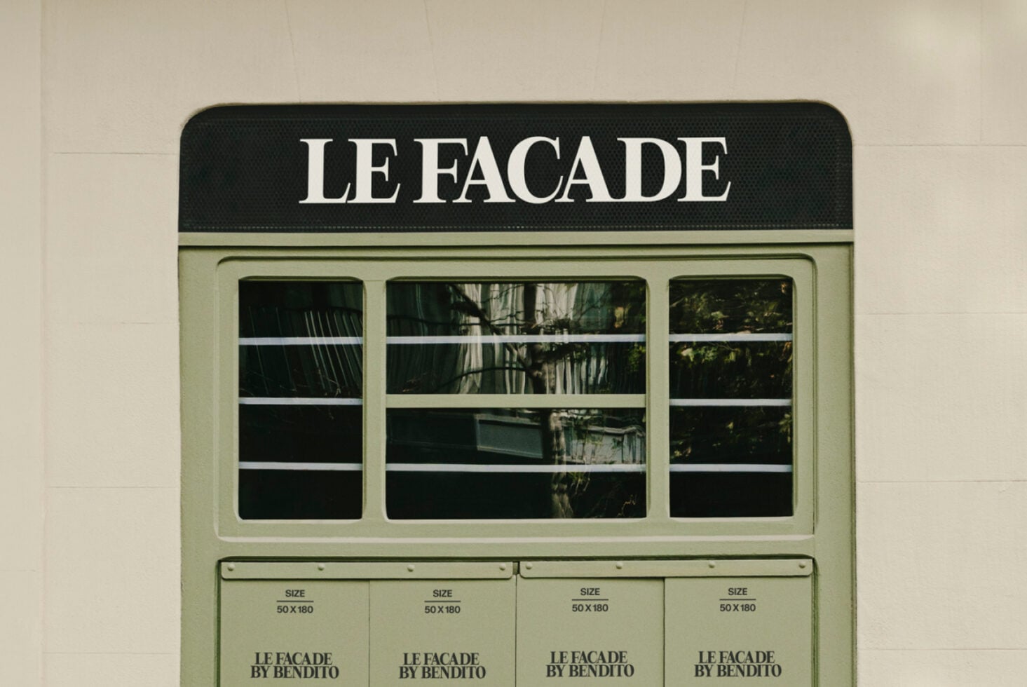 Sage green storefront mockup with Le Facade branding, three display windows with product sizing